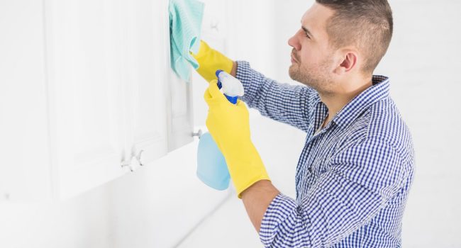 man-cleaning-his-home-scaled-1.jpg